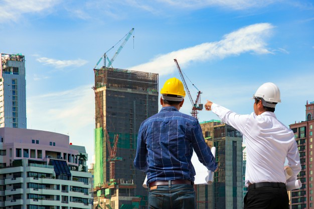 مصنع الصيغconstruction-engineers-working-construction-site-management-construction-site_28668-42